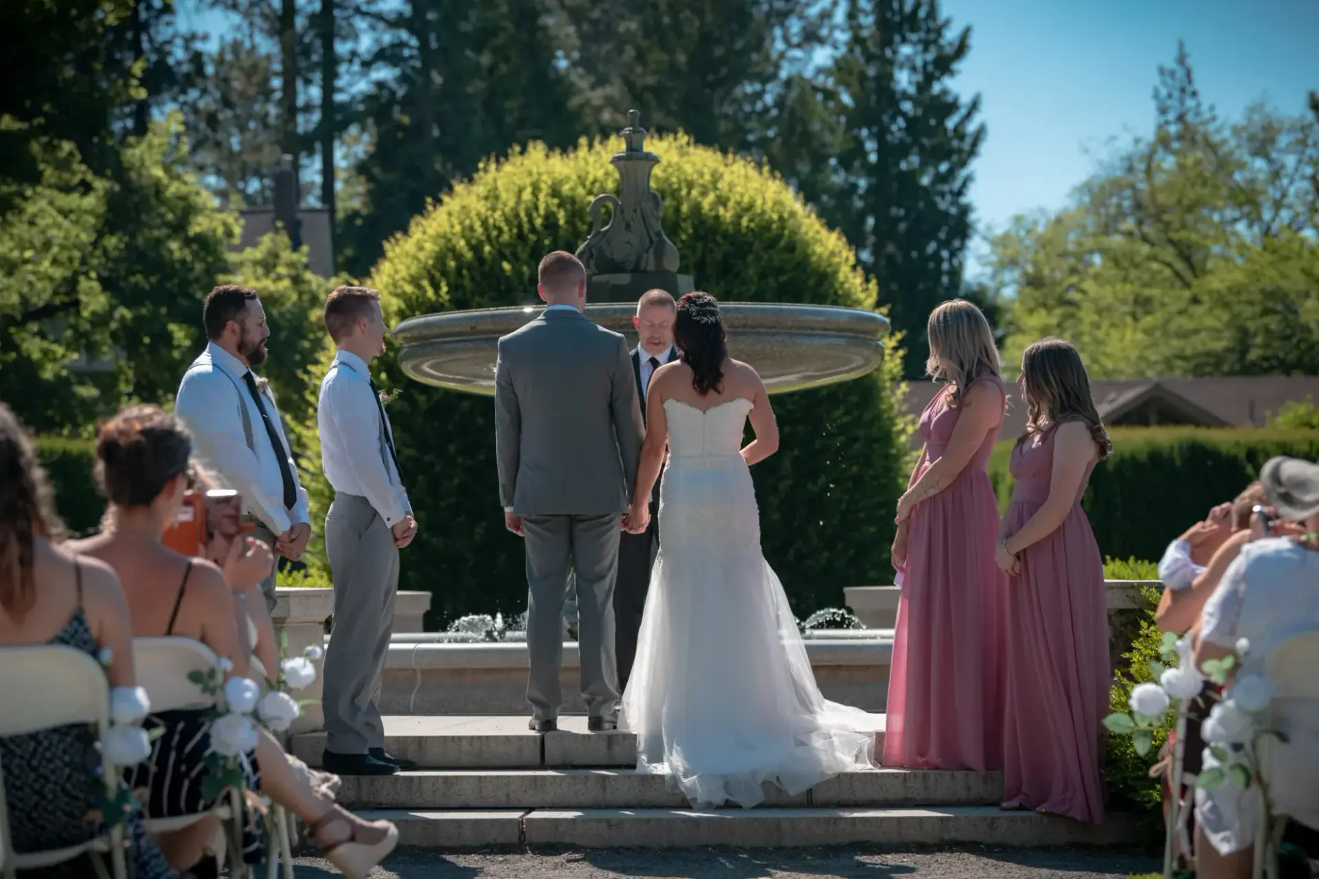 Couple exchanging vows at an outdoor wedding ceremony, Weddings gallery cover